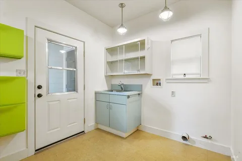 a room with a washer and dryer