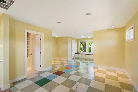 a view of a bathroom with a glass door shower and a bathtub
