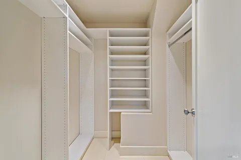 a view of front door with white walls