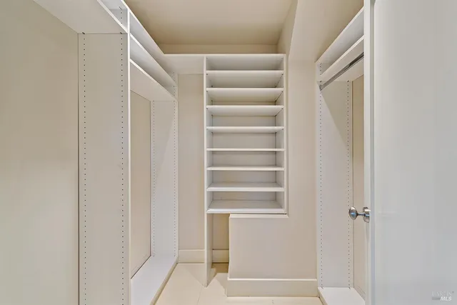 a view of front door with white walls