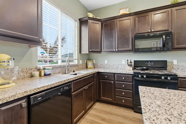 a bathroom with a sink double vanity and a mirror