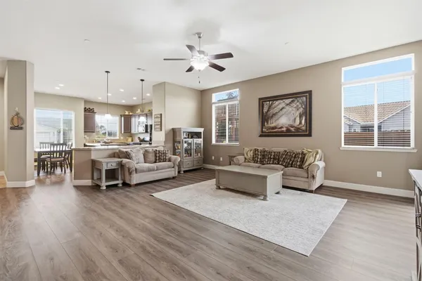 a kids room that has a bed and a window