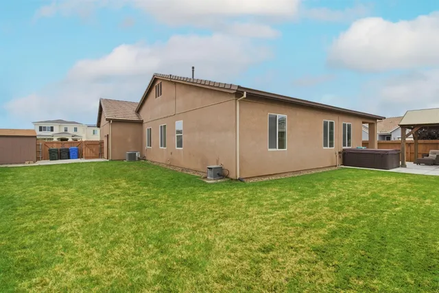 a view of backyard of house