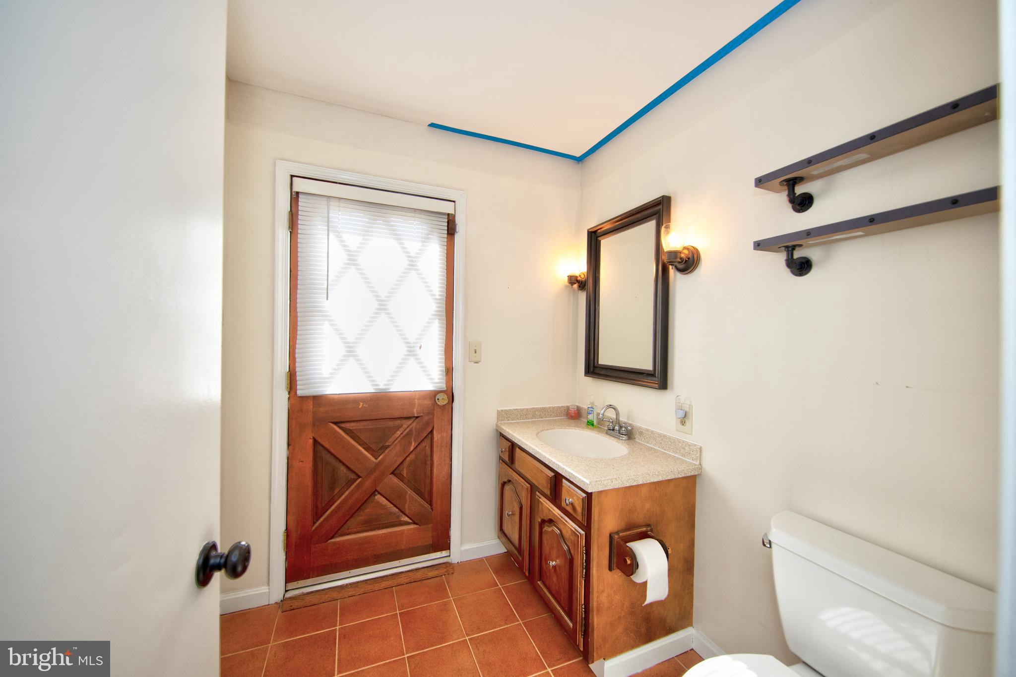 8007 Yellowstone Road Kingsville, MD 21087 - Photo 12 of 46 Main level powder room