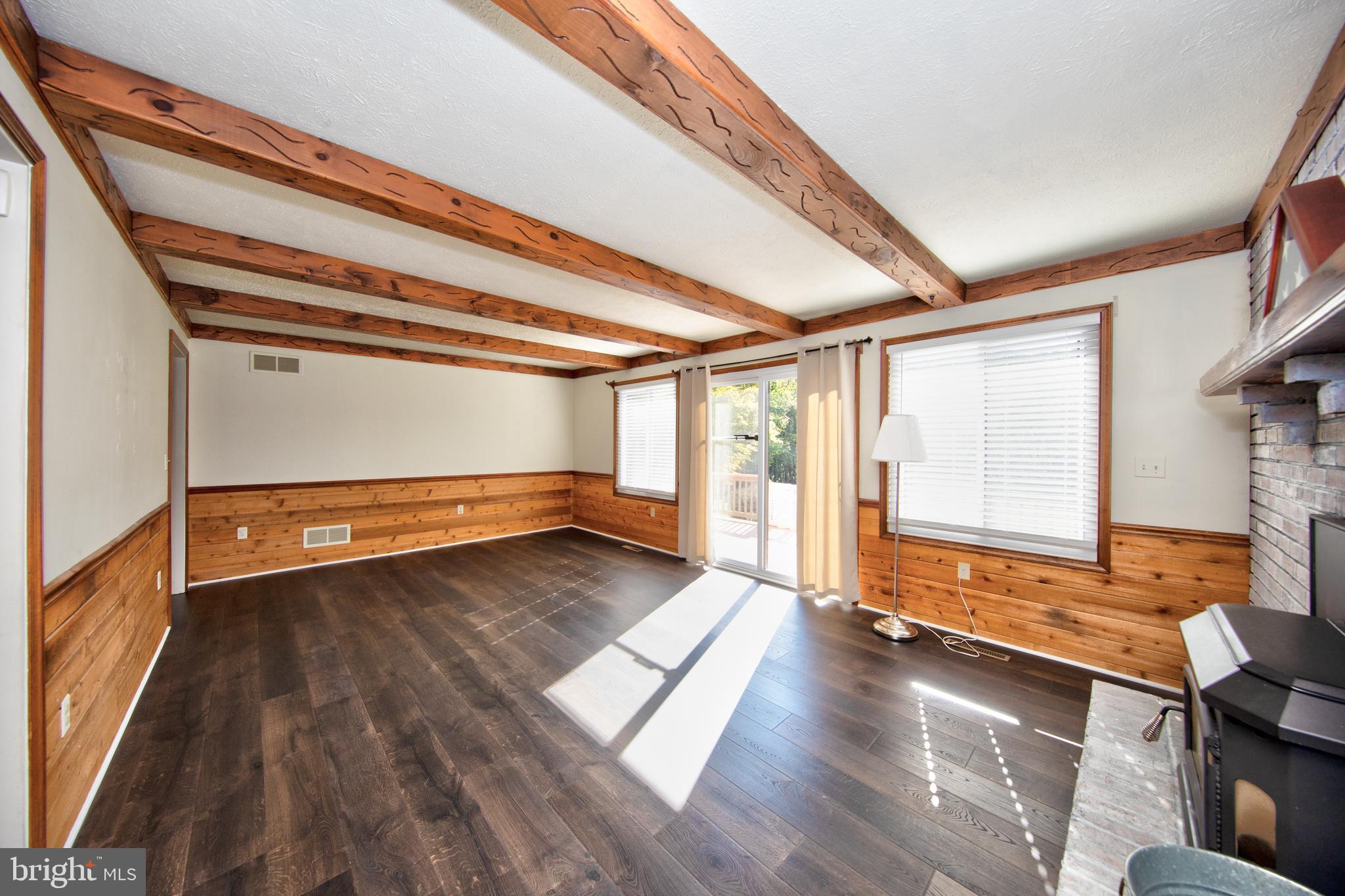 8007 Yellowstone Road Kingsville, MD 21087 - Photo 20 of 46 Family room with sliders leading to deck #2