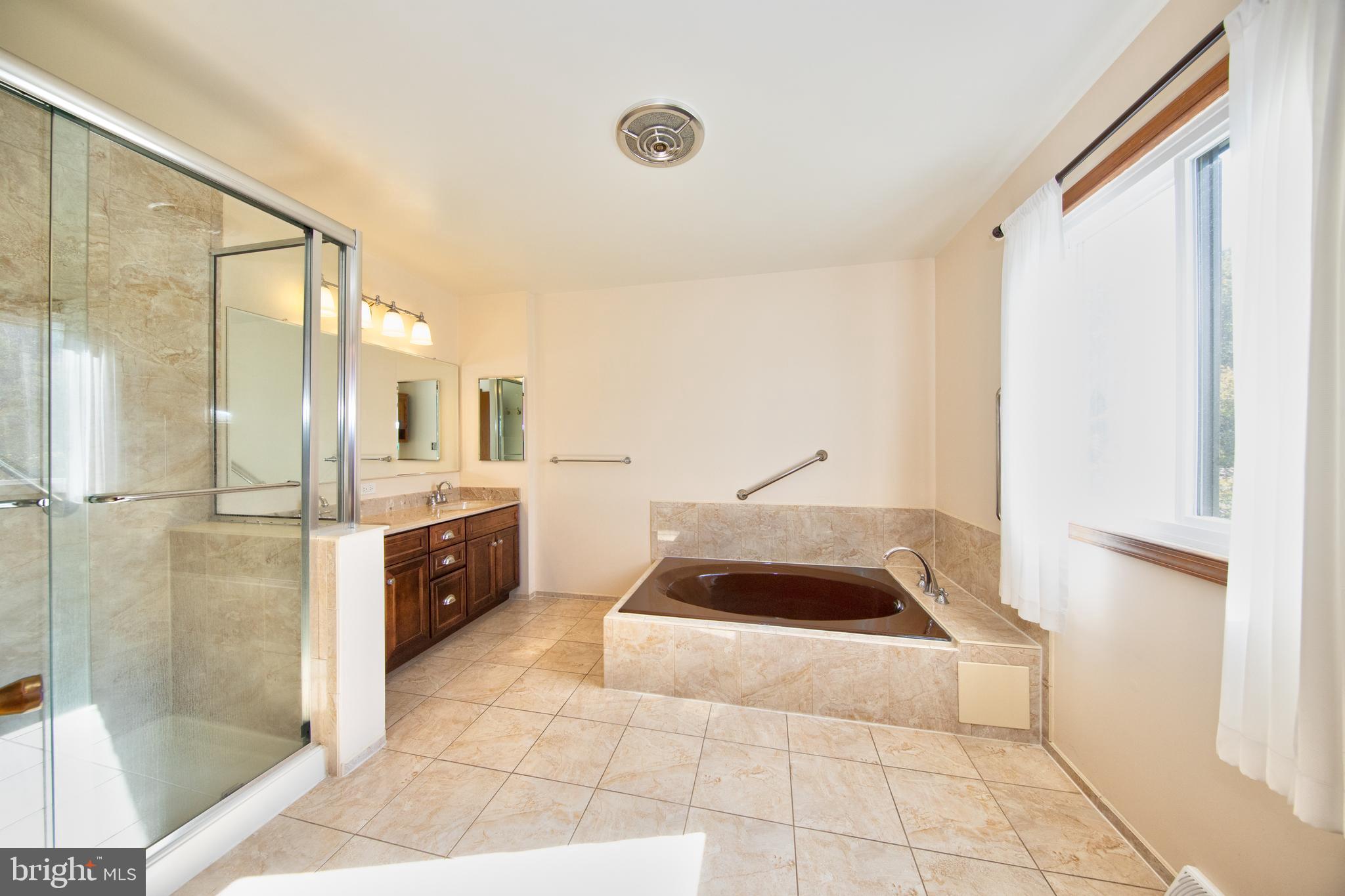 8007 Yellowstone Road Kingsville, MD 21087 - Photo 24 of 46 Primary bath with soaking tub & double vanity