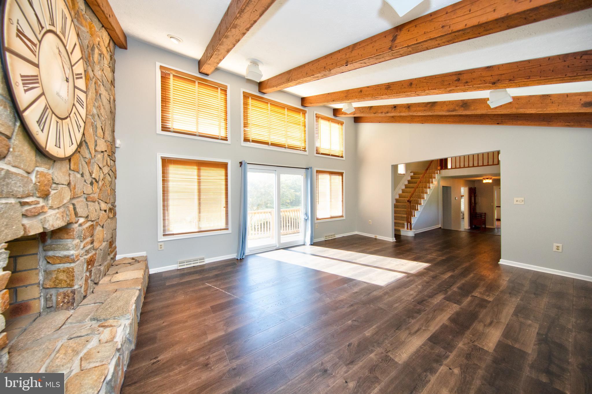 8007 Yellowstone Road Kingsville, MD 21087 - Photo 9 of 46 Living room w/ sliders leading to deck
