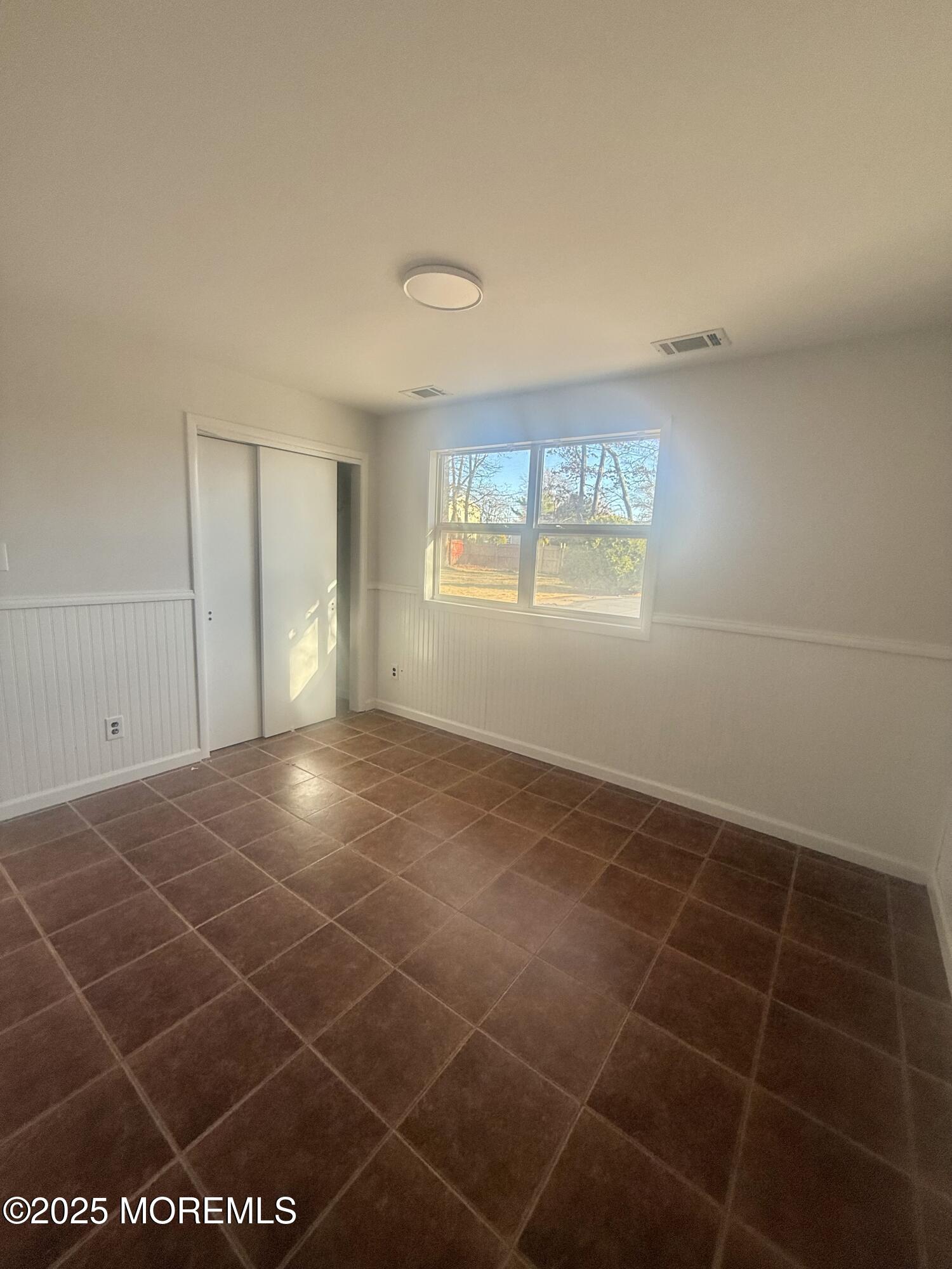 117 Greymoor Road Howell, NJ 07731 - Photo 33 of 41 a view of an empty room with a window