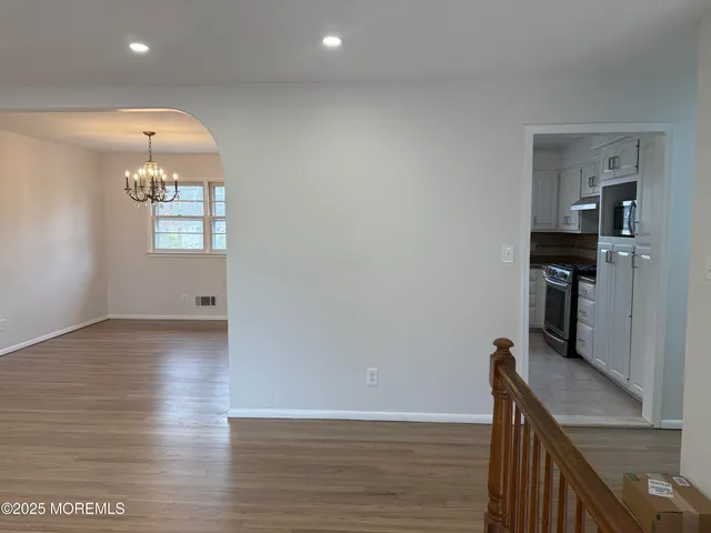 a bathroom with a toilet a sink and shower