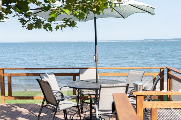 a view of a chairs and table in the terrace