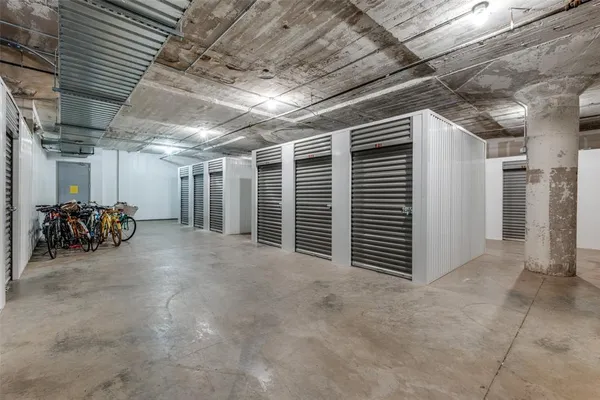 a view of empty room with refrigerator