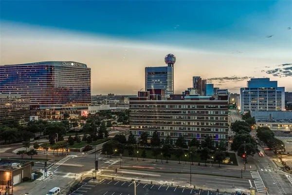 a view of a city with tall buildings