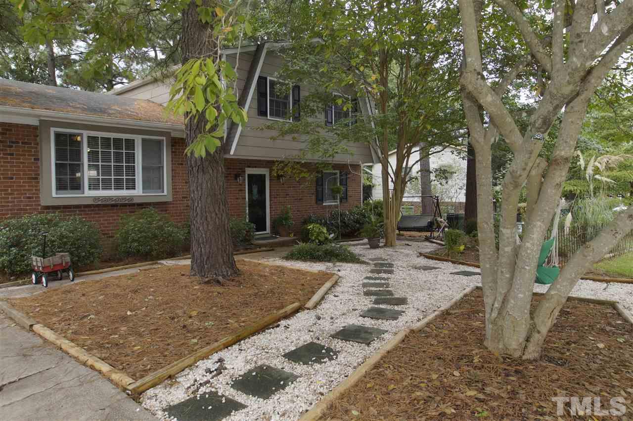 4125 Pittsford Road Raleigh, NC 27604 - Photo 2 of 20 a view of a house with yard and tree in the background
