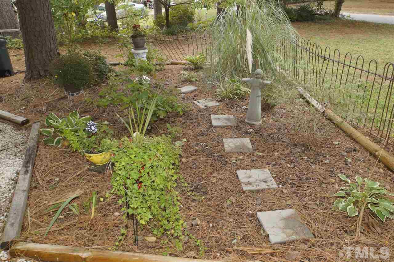 4125 Pittsford Road Raleigh, NC 27604 - Photo 3 of 20 a picture of a yard