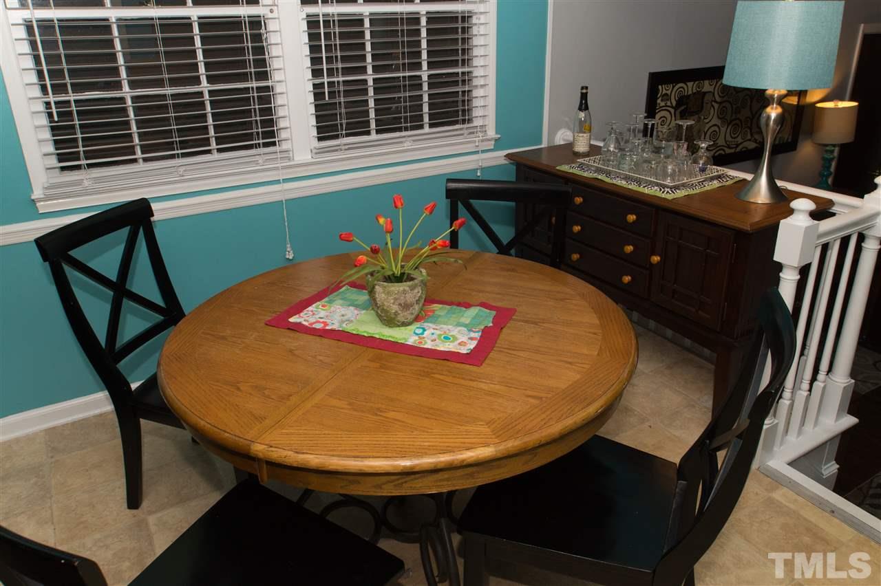 4125 Pittsford Road Raleigh, NC 27604 - Photo 10 of 20 a view of a dining room with furniture