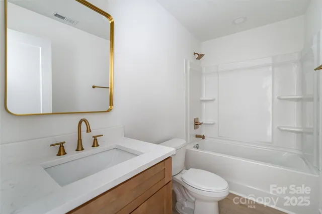 a view of a balcony with wooden floor