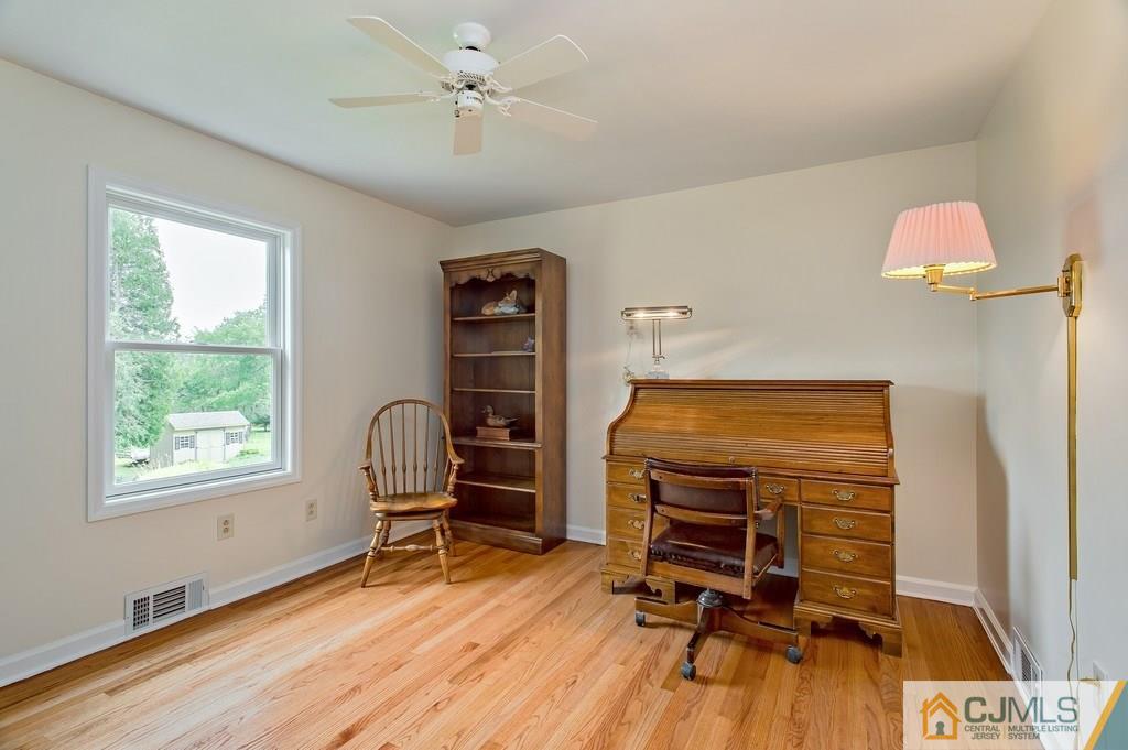 1670 Washington Valley Road Bridgewater, NJ 08836 - Photo 12 of 18 a view of a workspace with furniture and a window
