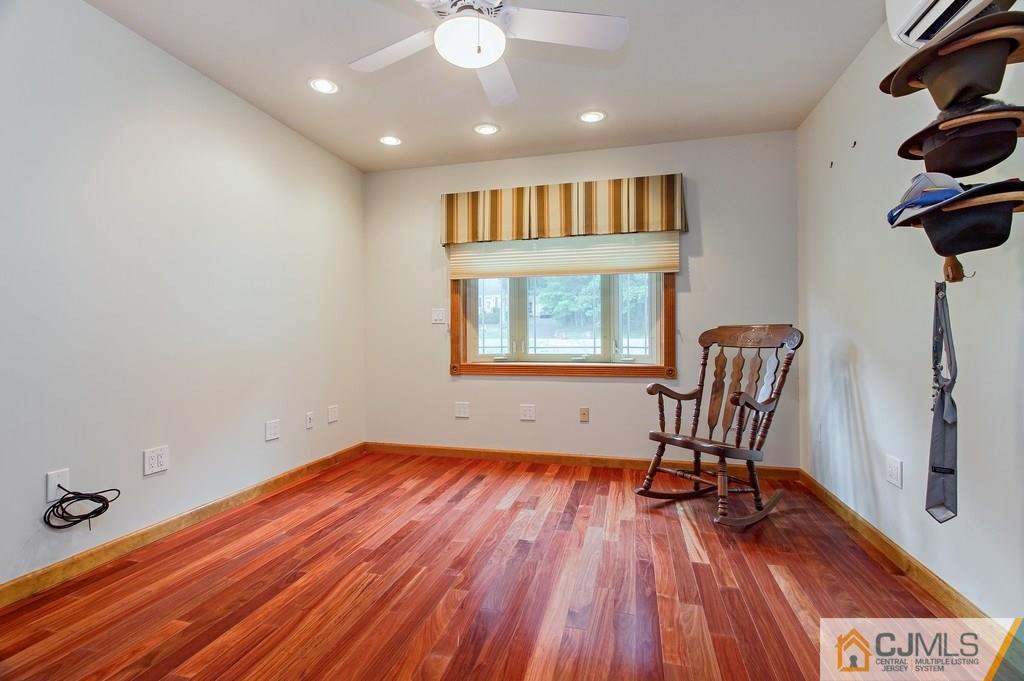 1670 Washington Valley Road Bridgewater, NJ 08836 - Photo 13 of 18 a view of livingroom with furniture and wooden floor