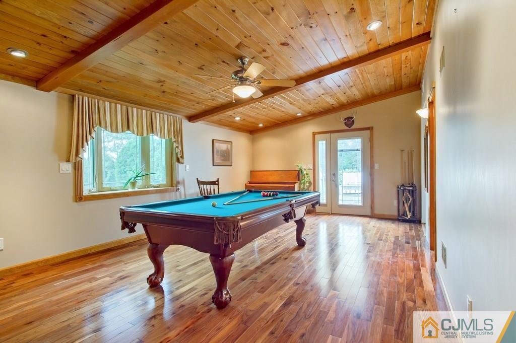 1670 Washington Valley Road Bridgewater, NJ 08836 - Photo 9 of 18 a room with furniture pool table wooden floor and windows