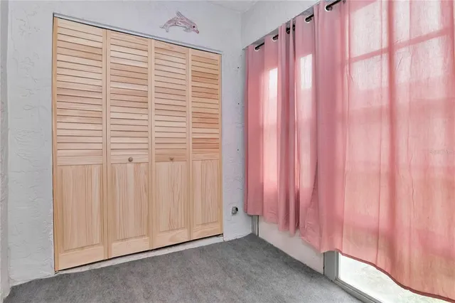 a view of a room with a window