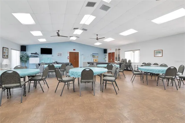 a group of people sitting in a living room