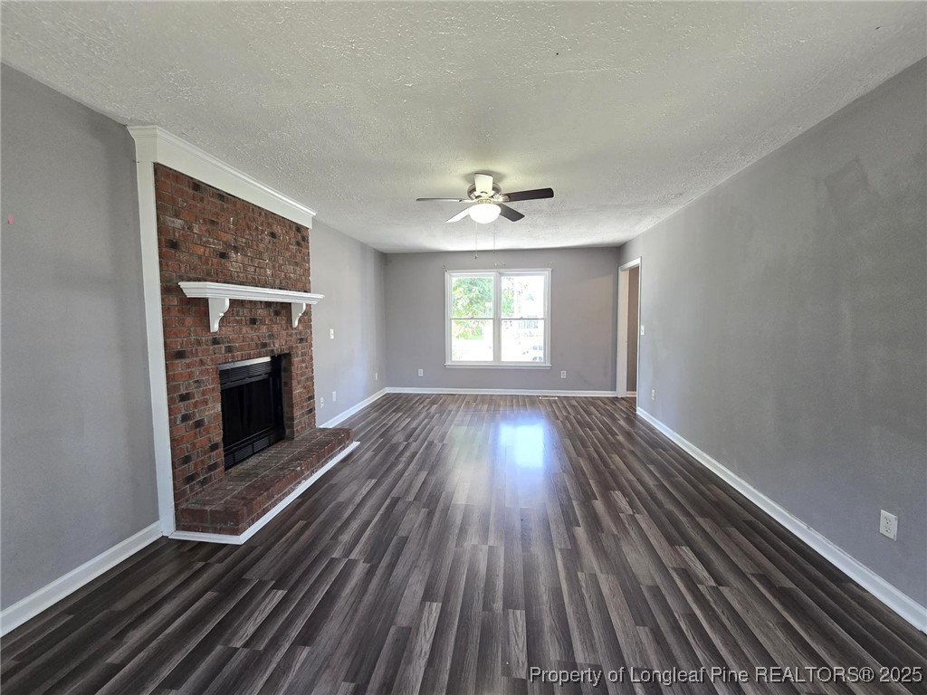 7132 Dayspring Drive Fayetteville, NC 28314 - Photo 11 of 44 wooden floor in an empty room with a window