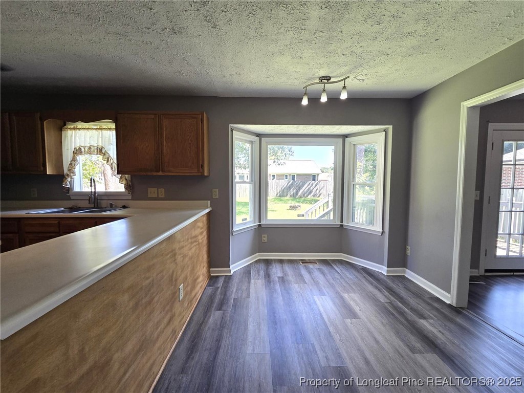7132 Dayspring Drive Fayetteville, NC 28314 - Photo 15 of 44 wooden floor in an empty room with a window