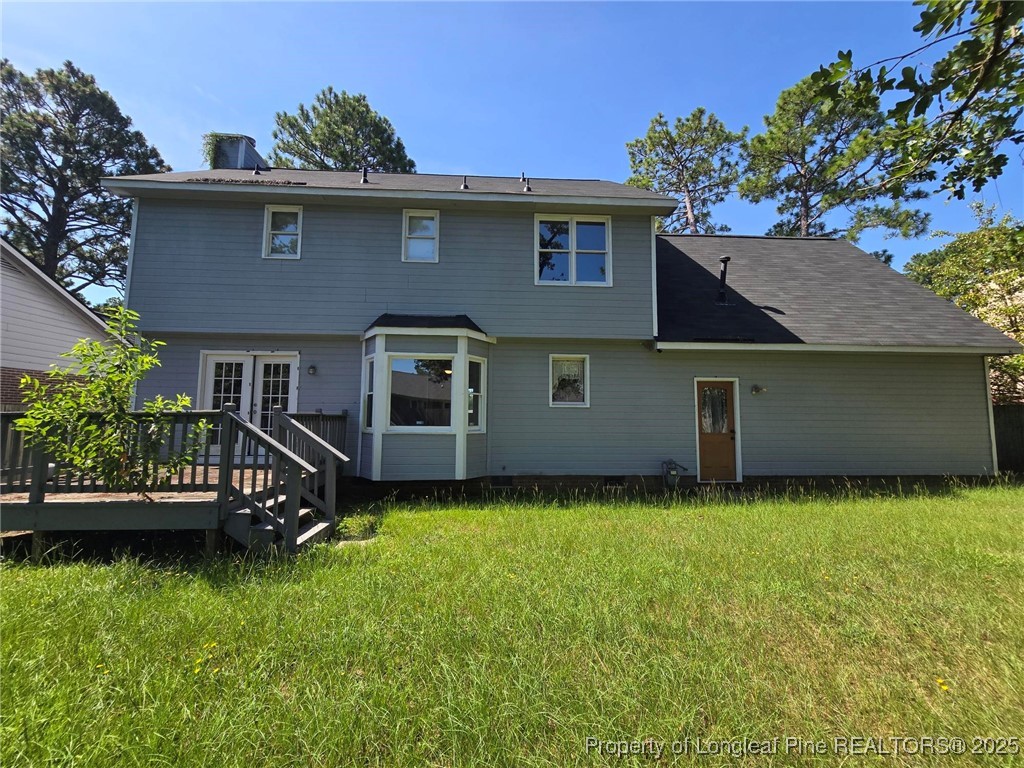 7132 Dayspring Drive Fayetteville, NC 28314 - Photo 24 of 44 a front view of a house with a garden
