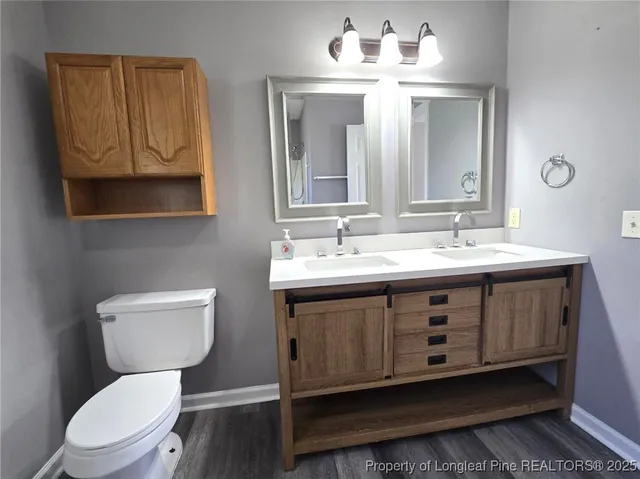 a bathroom with a toilet and a bathtub