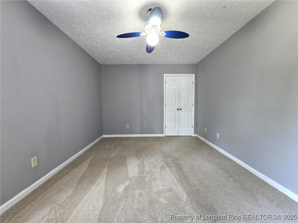 7132 Dayspring Drive Fayetteville, NC 28314 - Photo 41 of 44 a view of an empty room and chandelier fan