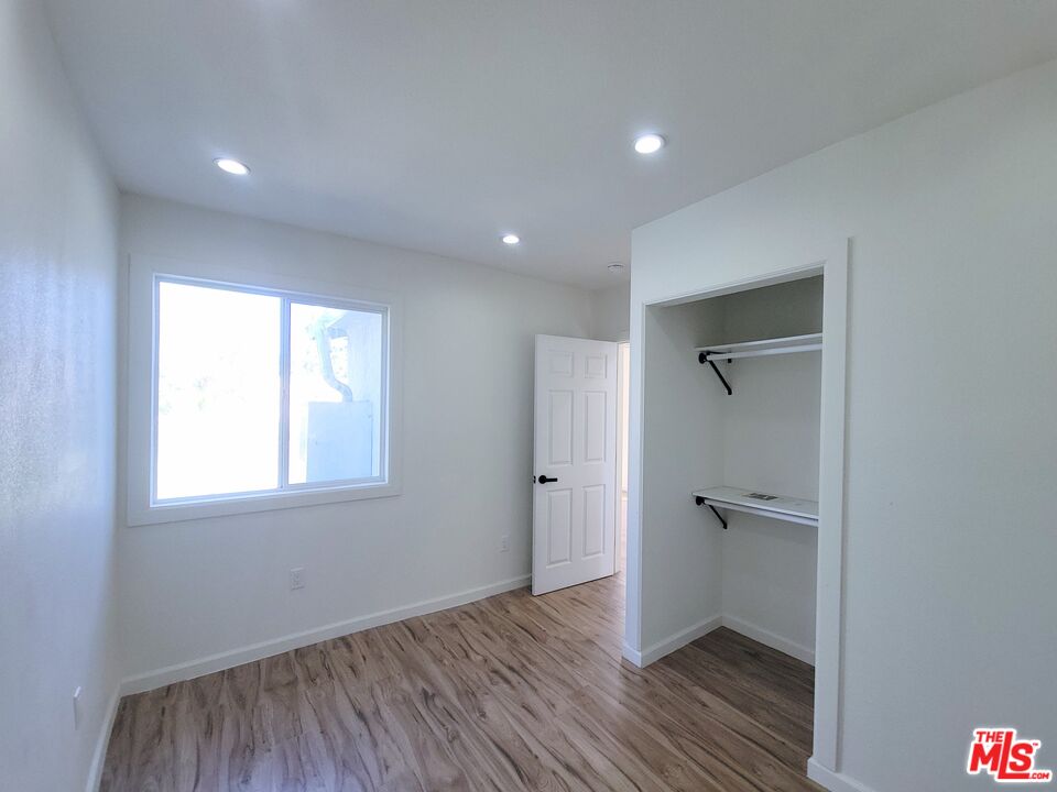 200 North Acacia Avenue Compton, CA 90220 - Photo 13 of 18 a view of a room with wooden floor and a window