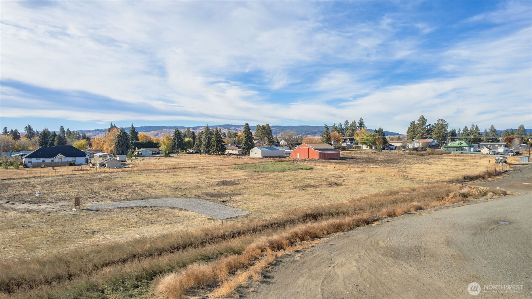 601 East 1st Street Waterville, WA 98858 - Photo 5 of 18 a view of swimming pool with outdoor seating