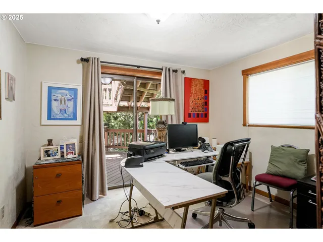 a workspace with furniture and window