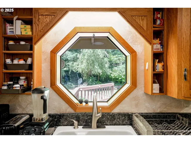 a front view of a house with a swimming pool