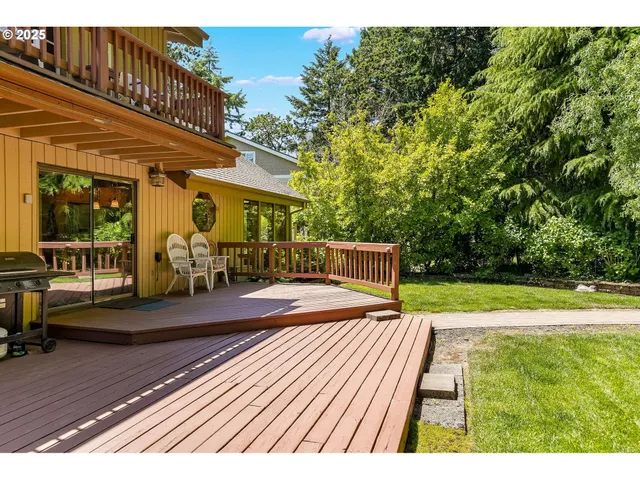 swimming pool view with a seating space