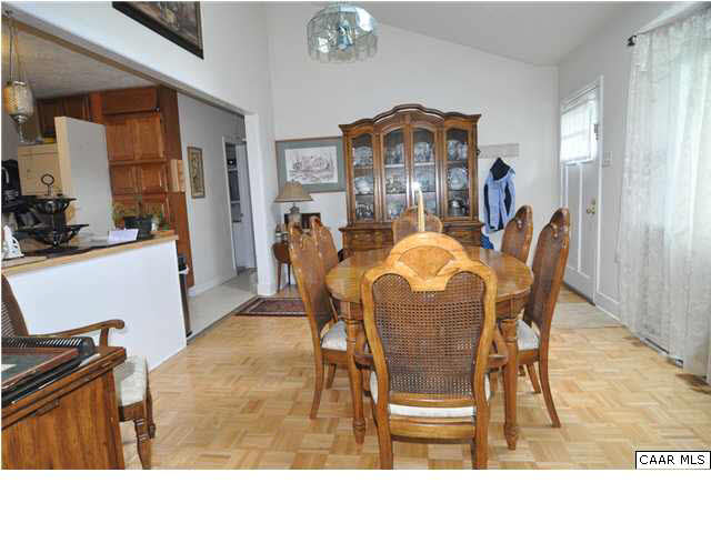 3425 Richmond Road Keswick, VA 22947 - Photo 11 of 22 a view of a dining room with furniture and a window