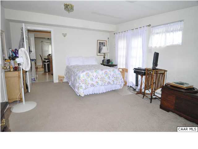 3425 Richmond Road Keswick, VA 22947 - Photo 18 of 22 a living room with furniture and a flat screen tv