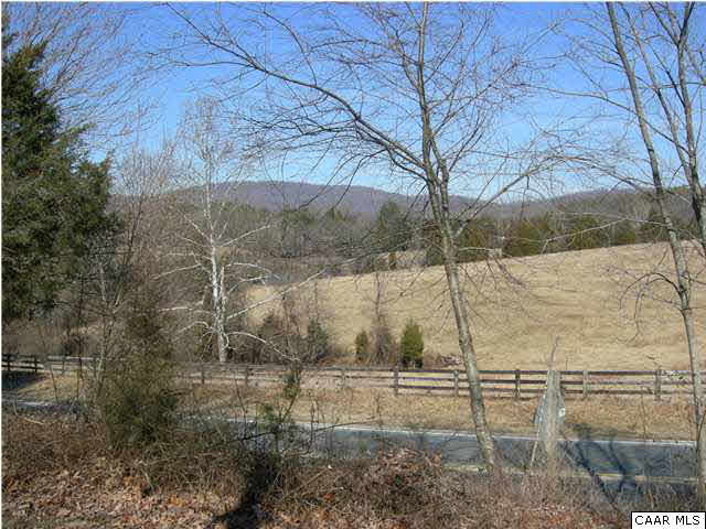 3425 Richmond Road Keswick, VA 22947 - Photo 21 of 22 a view of a backyard of the house