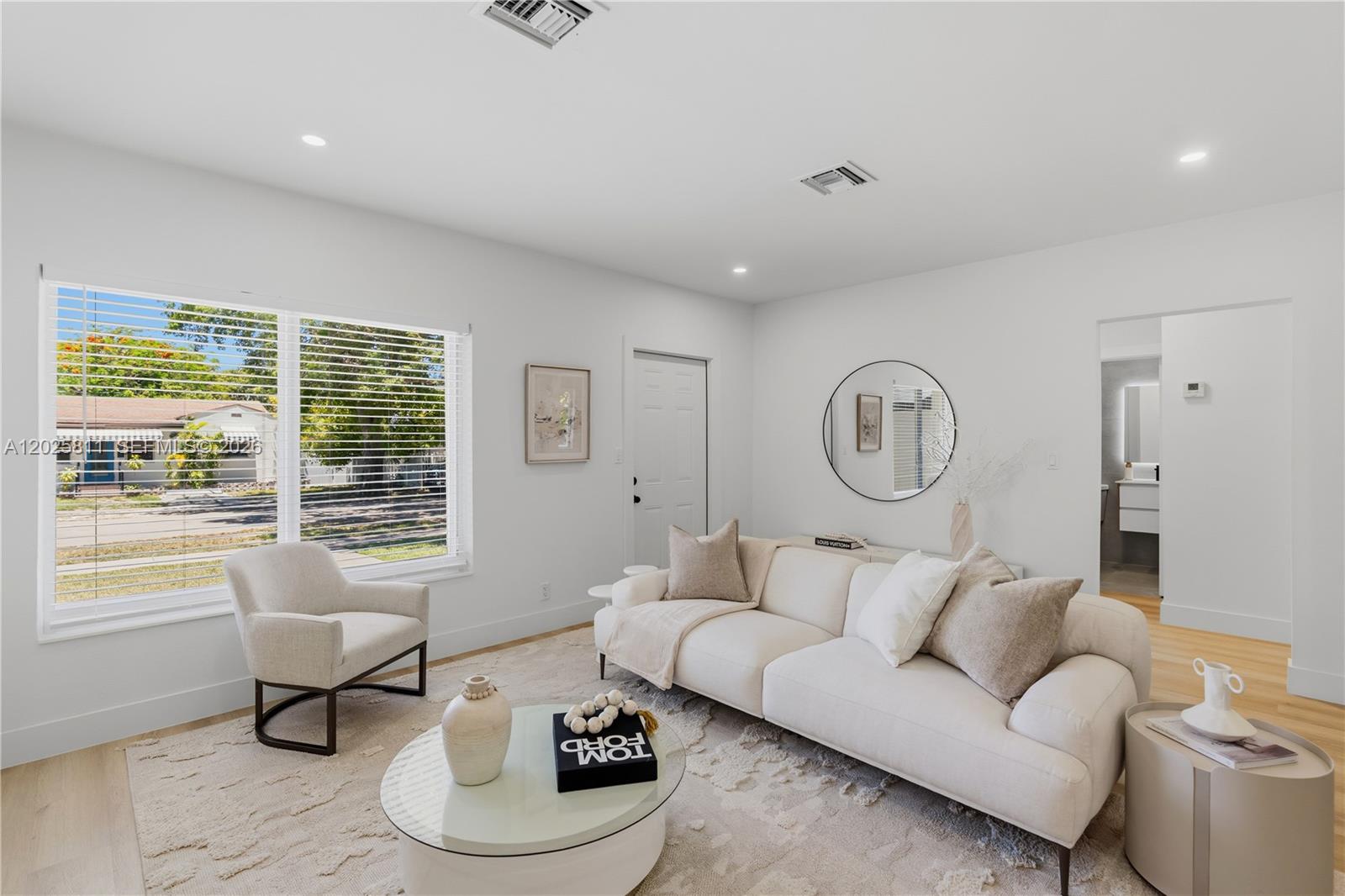2110 Southwest 15th Street Miami, FL 33145 - Photo 6 of 37 a living room with furniture and a large window