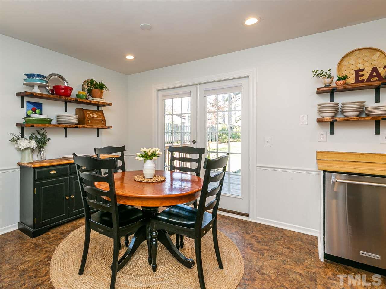 7705 Prospector Place Raleigh, NC 27615 - Photo 11 of 30 a view of a dining room with furniture
