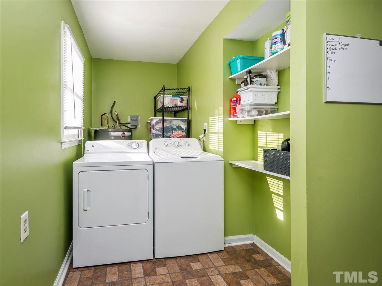 7705 Prospector Place Raleigh, NC 27615 - Photo 25 of 30 a utility room with dryer and washer