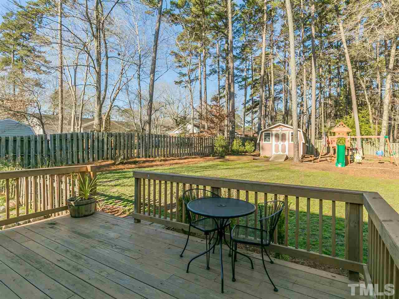 7705 Prospector Place Raleigh, NC 27615 - Photo 29 of 30 a view of a bench in a patio
