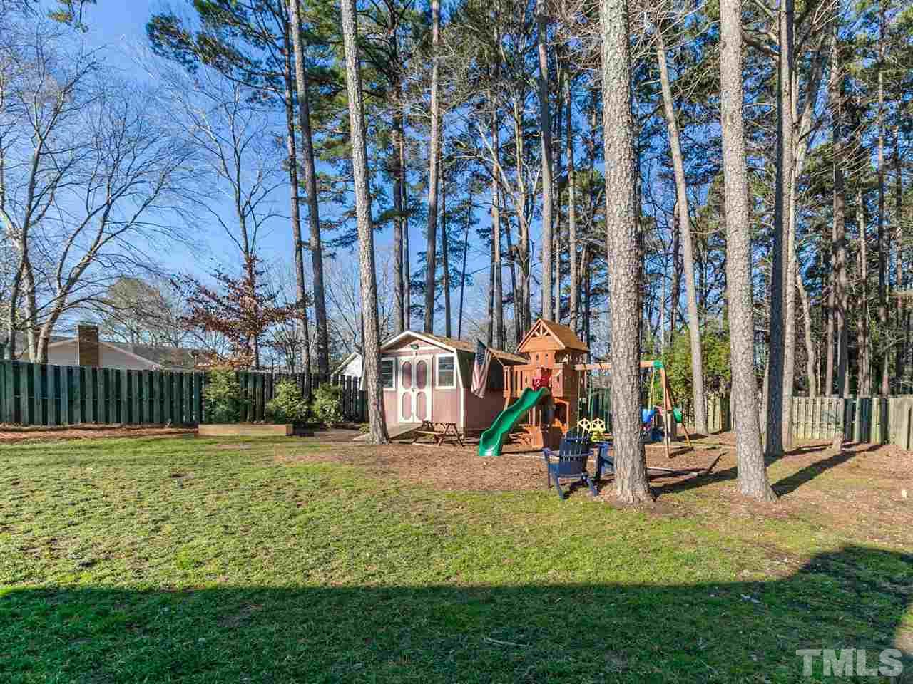 7705 Prospector Place Raleigh, NC 27615 - Photo 5 of 30 a view of outdoor space with garden and entertaining space