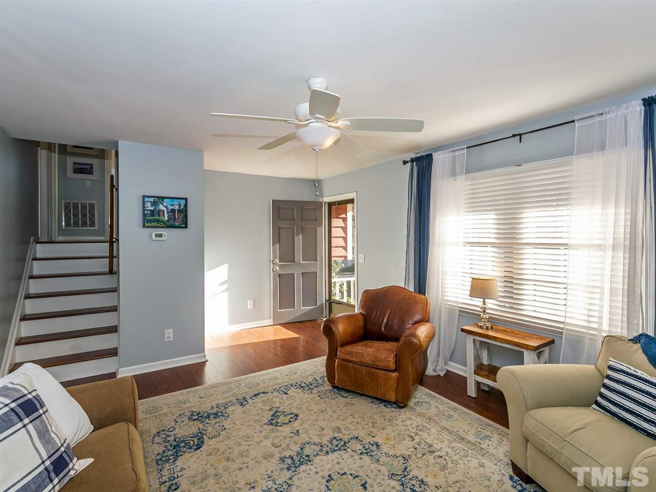 7705 Prospector Place Raleigh, NC 27615 - Photo 6 of 30 a living room with furniture and a window
