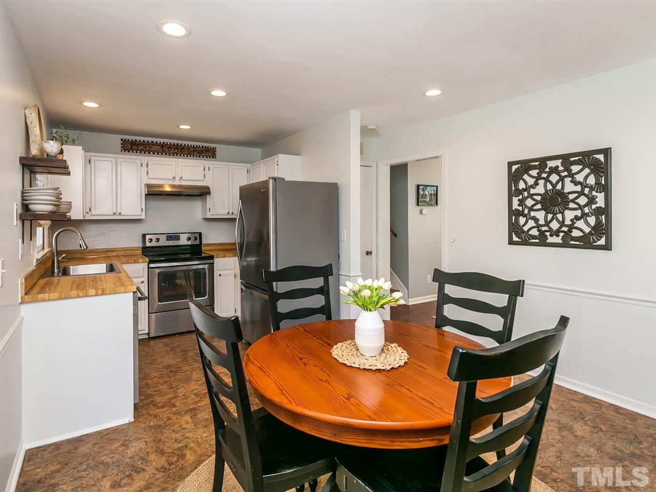 7705 Prospector Place Raleigh, NC 27615 - Photo 10 of 30 a view of a dining room with furniture