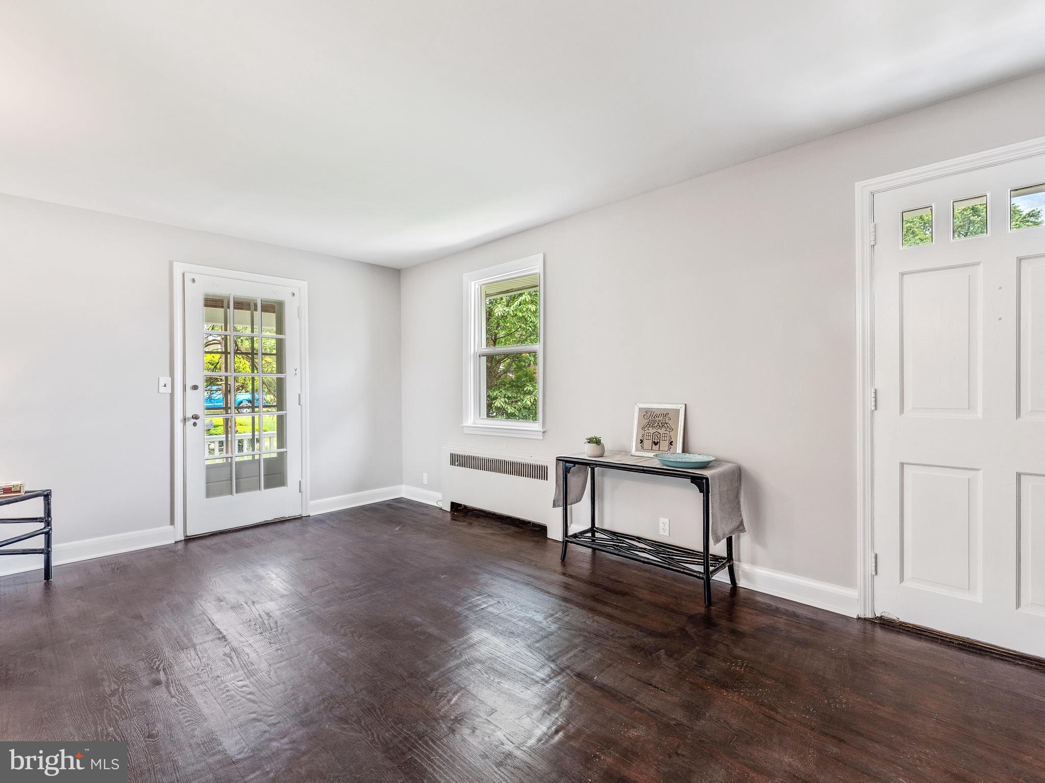 4203 Fordham Road Baltimore, MD 21229 - Photo 4 of 36 Living room with door to covered porch