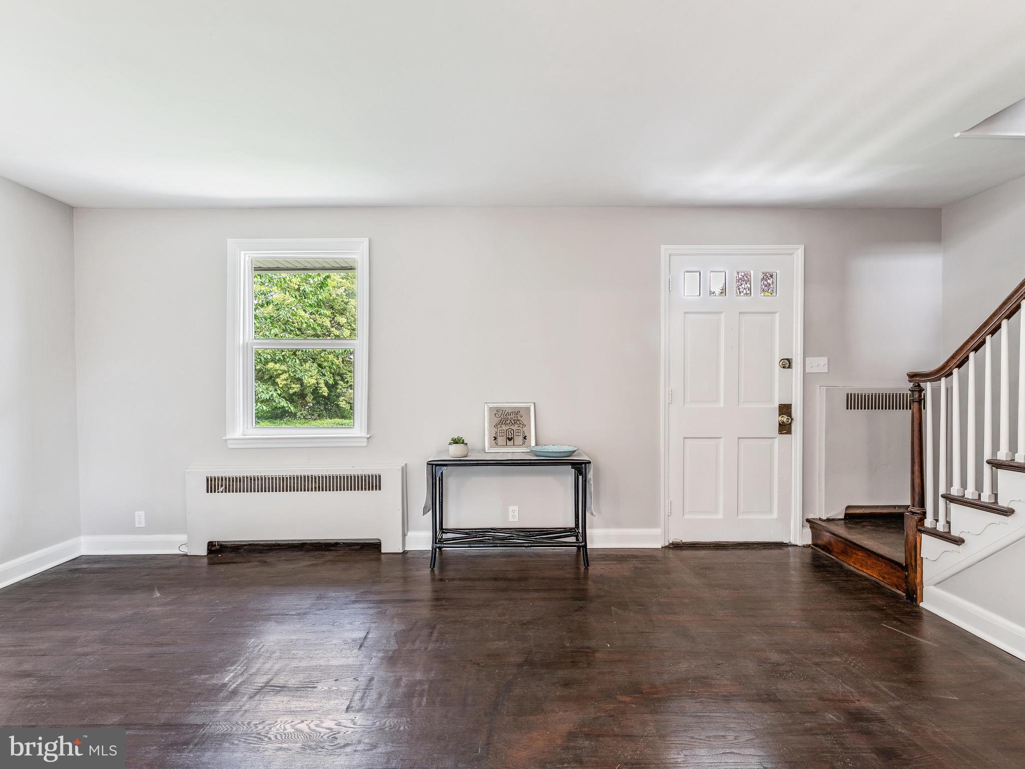 4203 Fordham Road Baltimore, MD 21229 - Photo 5 of 36 Freshly painted and rich colored hardwoods