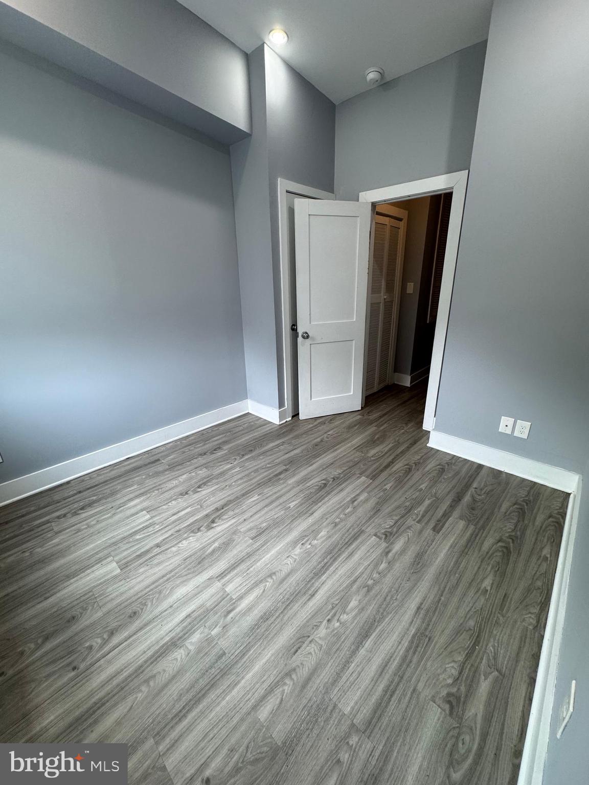 1522 Willington Street, Unit 2 Philadelphia, PA 19121 - Photo 16 of 29 a view of empty room with wooden floor