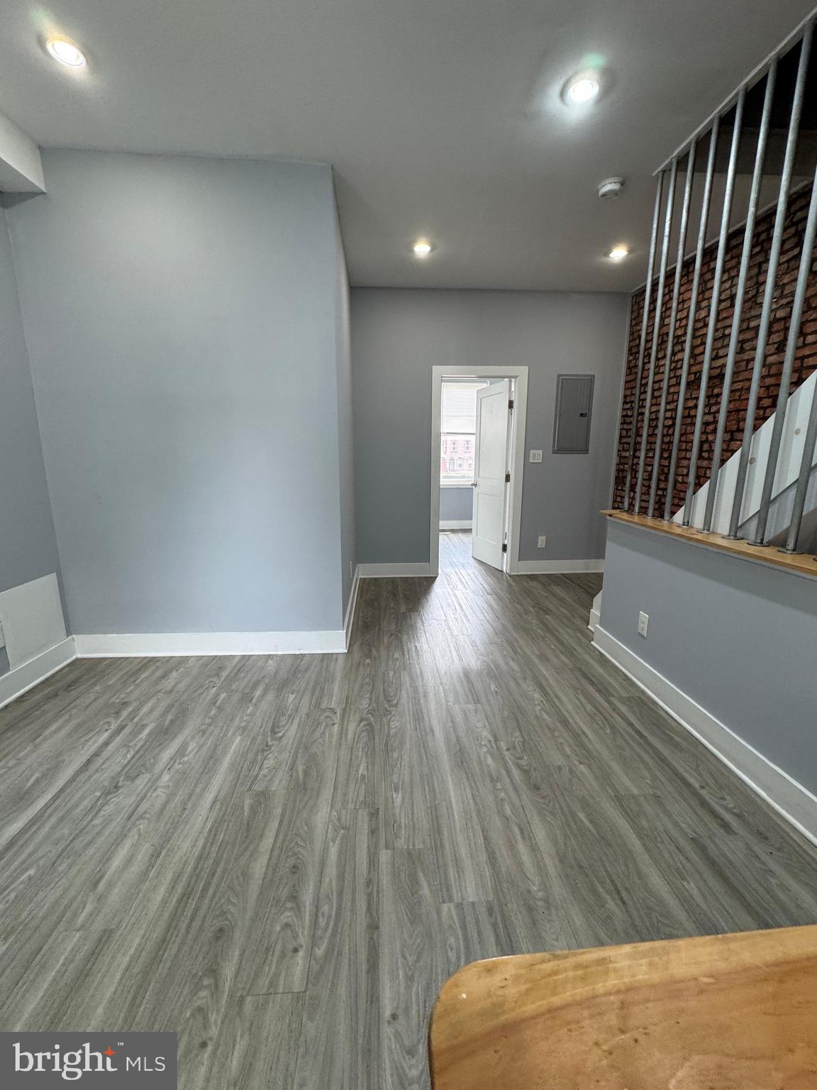 1522 Willington Street, Unit 2 Philadelphia, PA 19121 - Photo 3 of 29 a view of hallway with stairs and wooden floor