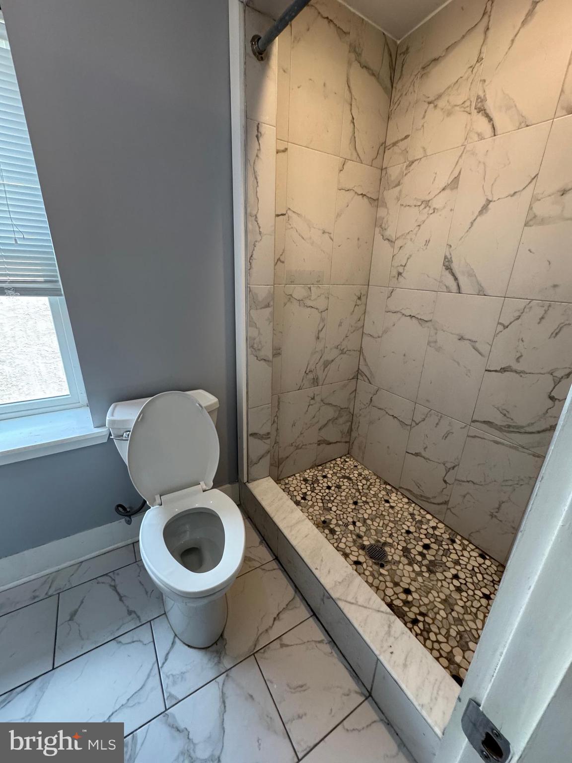 1522 Willington Street, Unit 2 Philadelphia, PA 19121 - Photo 6 of 29 a bathroom with a sink and a toilet